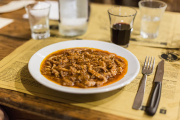 A Tripe Dish On A Restaurant Table