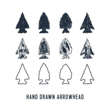 Hand drawn textured arrowheads vector illustrations set.