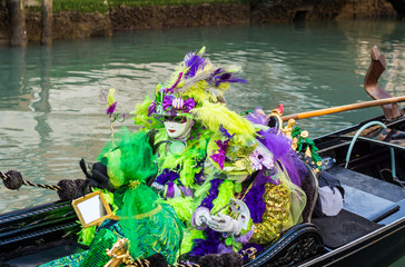 Obraz premium Venice, Italy, February 6, 2016 : couple in mask and costume at the carnival in Venice. The Carnival of Venice is an annual festival, world famous for its elaborate masks.