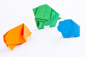 Three origami elephants - white background