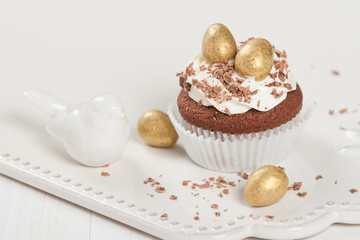 Easter Cupcake Decorated With Golden Chocolate Eggs. Home Baked.