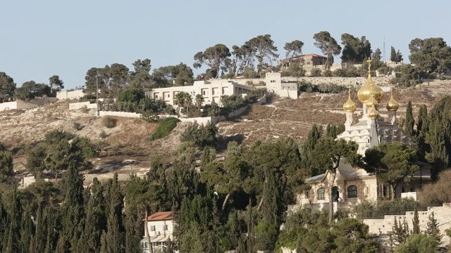 panning shot of the russian church of mary magdalene on the mount of olives in jerusalem, israel