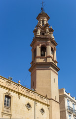 Fototapeta na wymiar Tower of the Salvador and Santa Monica church in Valencia