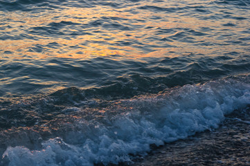 Amazing sea sunset, the sun, waves, clouds