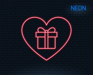 Neon light. Love Gift box line icon. Present or Sale sign. Birthday Shopping symbol. Package in Gift Wrap. Glowing graphic design. Brick wall. Vector