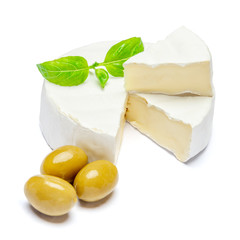 Round brie or camambert cheese on a white background