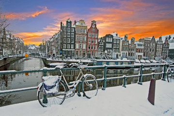 Cityscenic from Amsterdam in winter in the Netherlands at sunset © Nataraj