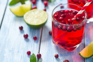 cranberry drink on wooden surface