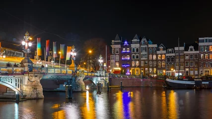Rucksack City scenic from Amsterdam at christmas at the Amstel in the Netherlands at night © Nataraj