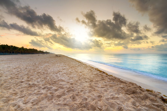 Sunrise on the beach of Caribbean sea, Mexico