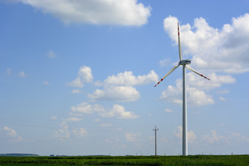 Fototapeta na wymiar Spring landscape with wind turbine