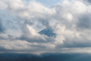 Fototapeta na wymiar Fuji-san behind the cloud,fuji mount famous iconic landmark of Japan