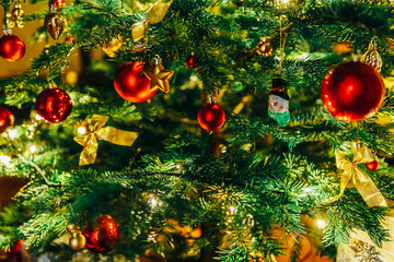 Obraz na płótnie Canvas Colorful Christmas Tree Decoration in Winter