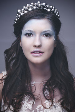 Portrait of ice queen or snow queen with crown