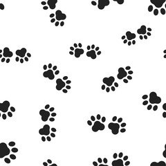 Fototapeta na wymiar Animal paw print seamless pattern background. Business flat vector illustration. Dog or cat pawprint sign symbol pattern.