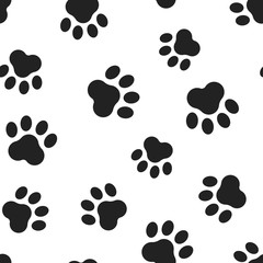 Fototapeta na wymiar Animal paw print seamless pattern background. Business flat vector illustration. Dog or cat pawprint sign symbol pattern.
