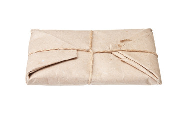 parcel wrapped with brown kraft paper