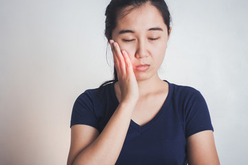 Woman has toothache.