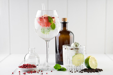 fancy gin and tonic selection drink alcohol cocktail craft fresh fruit spices mint glass bar  - obrazy, fototapety, plakaty