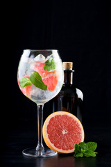 fancy gin and tonic selection drink alcohol cocktail craft fresh fruit spices mint glass bar 