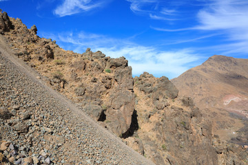 Atlas Mountains. Mountain slope on walking hiking trail. Morocco, winter. Wild nature landscape.