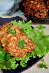 Vegetable pancakes on lettuce leaves. Vegetarian meal