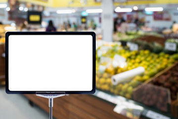 Supermarket grocery store abstract blur background with blank price board