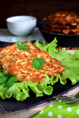 Vegetable pancakes on lettuce leaves. Vegetarian meal
