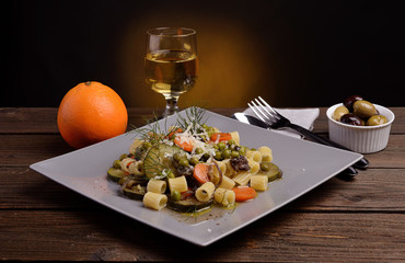 Ditalini pasta dish with peas carrots and zucchini