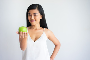 Smiling Beautiful Asian Woman Holding Green Apple