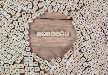 holiday name in letters on cube dices on table