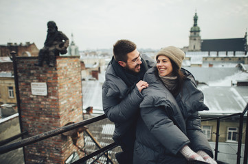 Christmas romantic sensual couple in love to cold winter day ove 