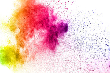 Multicolored powder explosion isolated on white background.