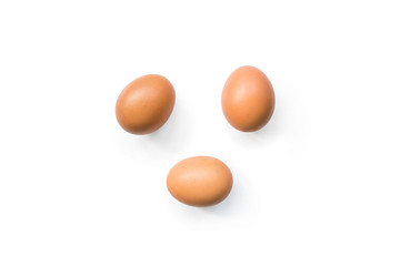 fresh brown organic chicken eggs isolated on white background. Horizontal composition. Top view