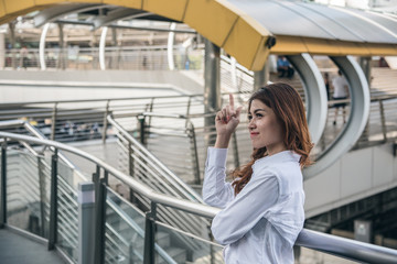 Portraits of beautiful asian woman look cheerful and confidence is standing and feeling success with work.