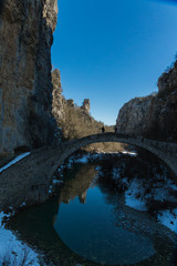 bridge old in Ioannina Zagori Greeece snow ice winter time