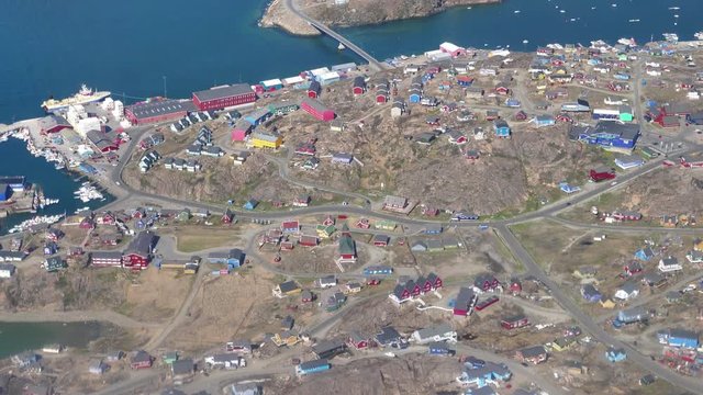 Colorful houses Sisimiut Greenland slow aerial flyover sunny summer day.mov