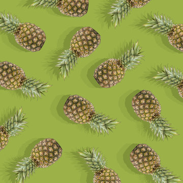 green background with image of ripe pineapple