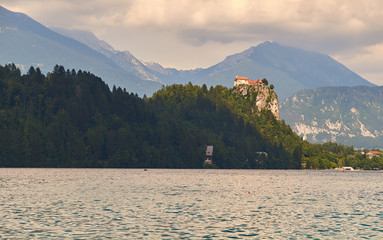 View of beautiful Bled castle on a cliff over the lake