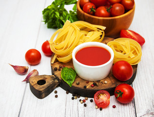 Bowl with tomato sauce