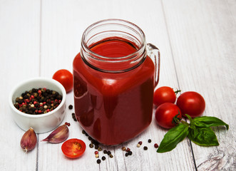 Jars with tomato juice