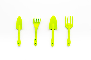 Gardening equipment concept on white background top view