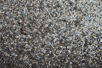 dark silver sequins reflecting light