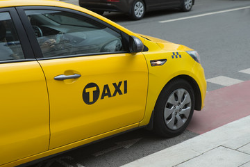 taxi moves on the city street
