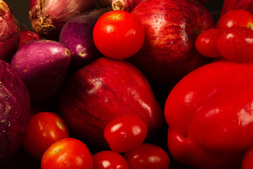 CU red vegetable and fruit mixed together at salad bar. Vegetarian, nutrition and healthy eating concept.