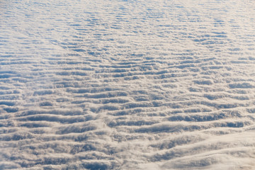 Clouds seen from airplane, concept of weather and climate change, cyclones and anticyclones