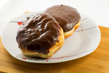 Chocolate donut on on the plate
