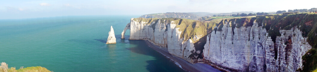 Beautiful aerial panoramic view of white chalk cliffs Aval, the needle rock and the stone arch,...