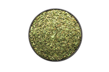 dried mint in clay bowl isolated on white background. Seasoning or spice top view