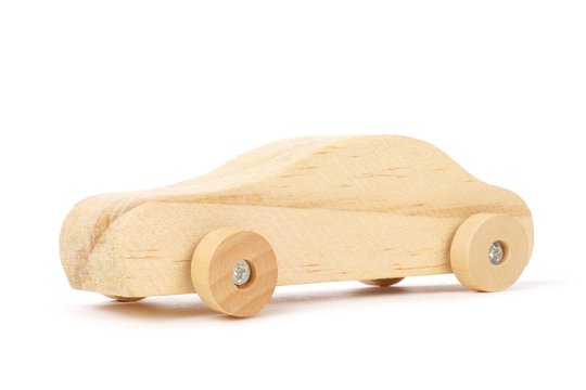 Wooden toy car isolated on a white background